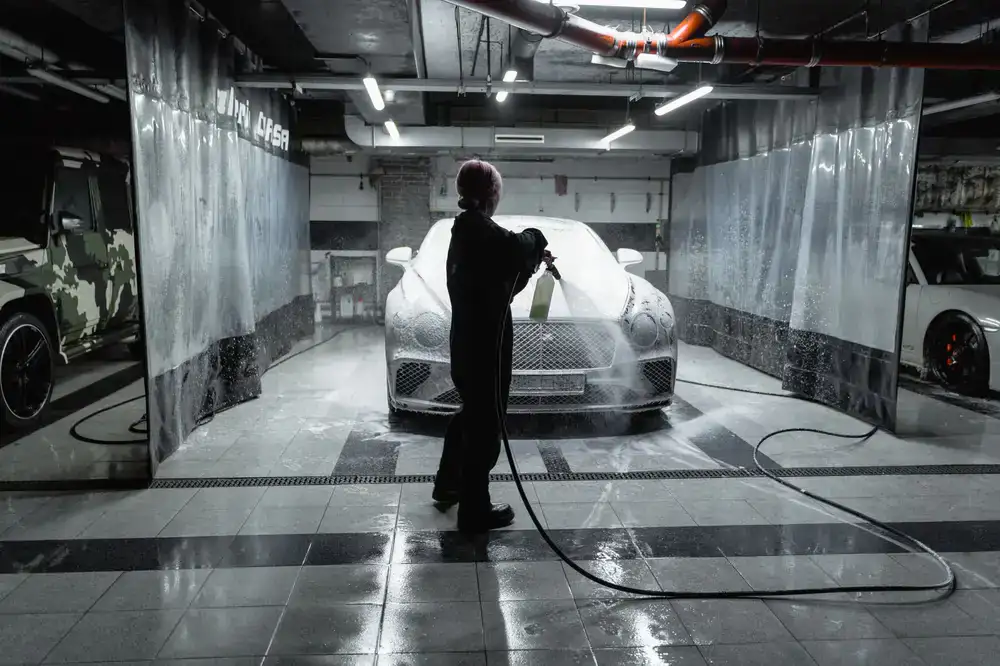 Snow foam application on car exterior